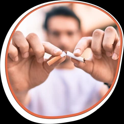 Man breaking a cigarette